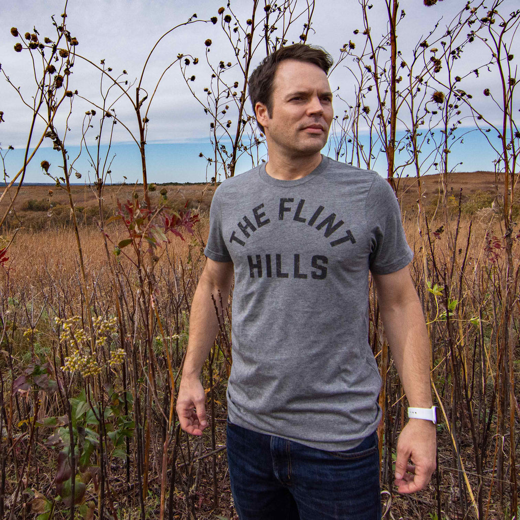 Person wearing a Kinfolk t-shirt titled, "the flint hills."