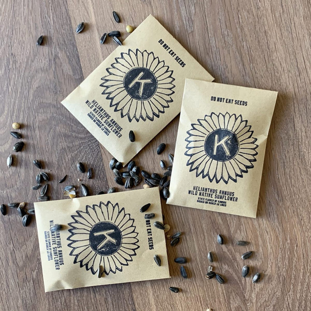 A collection of custom sunflower seed packets by Kinfolk.